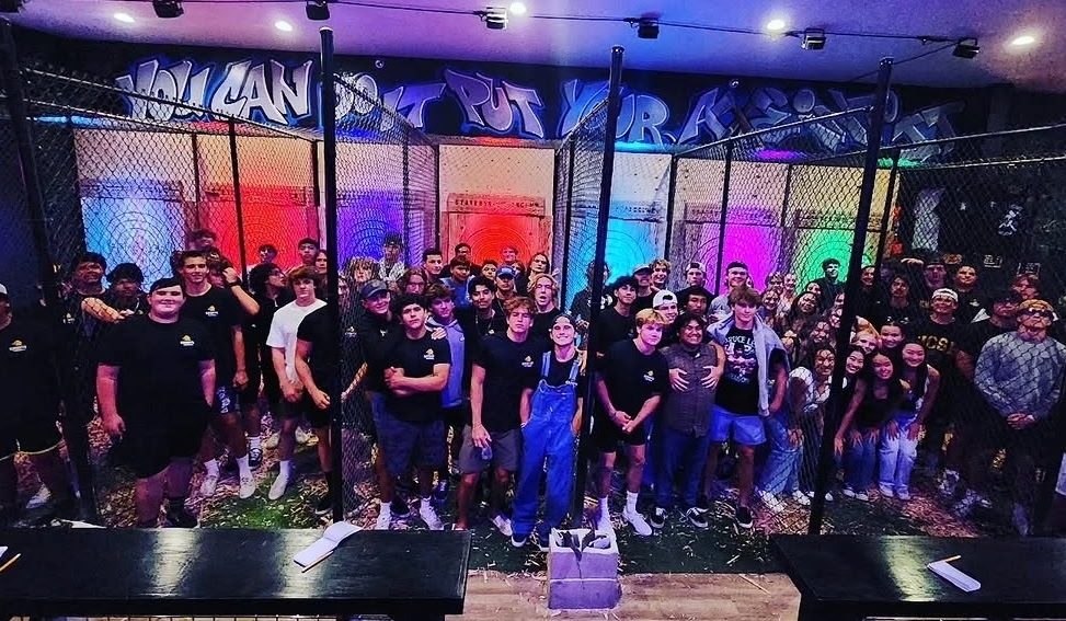 Large group axe throwing party at State Street Axe Club